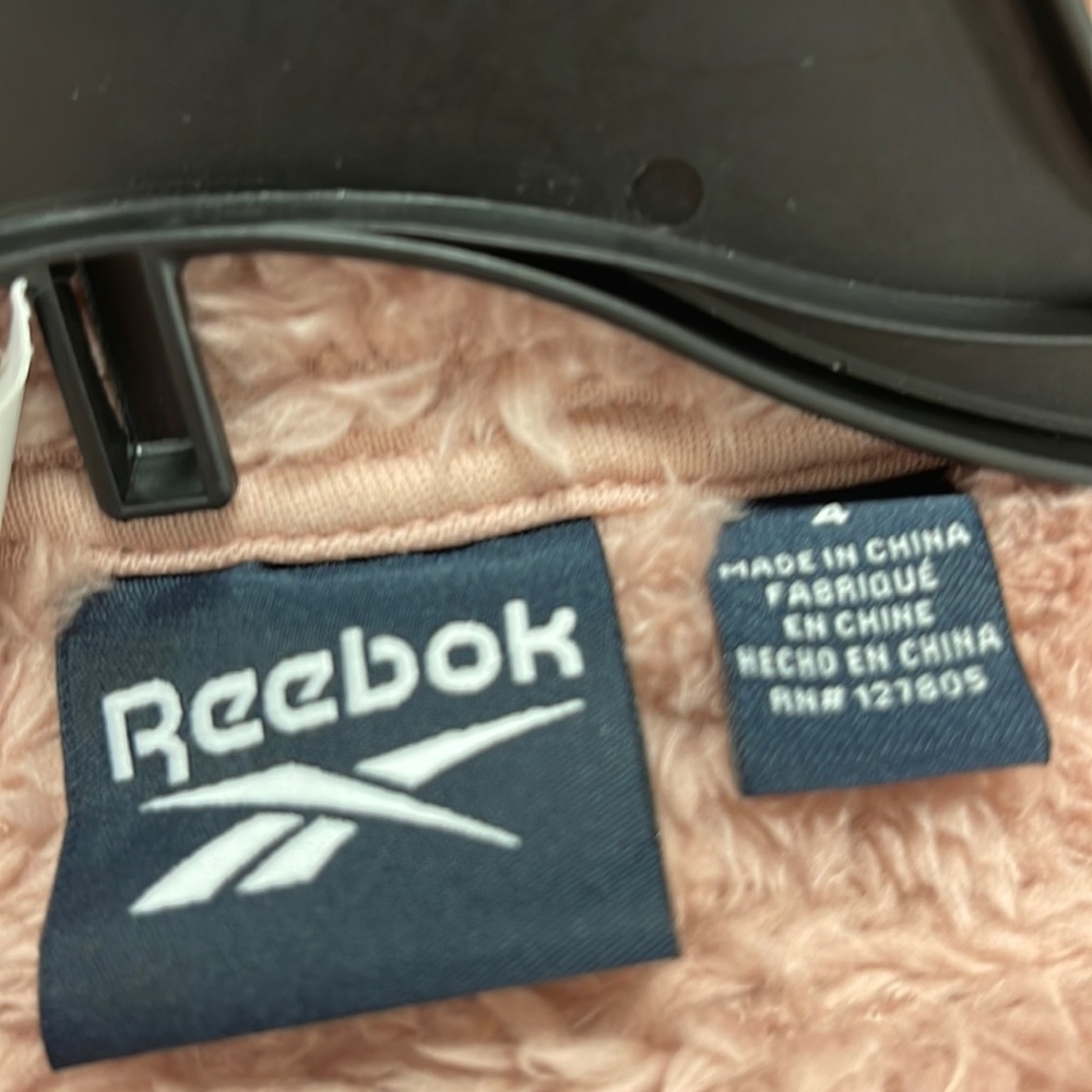 Reebok NWT girls fleece coat. Size 4. Brand new with tags. Color is Dusty Rose.